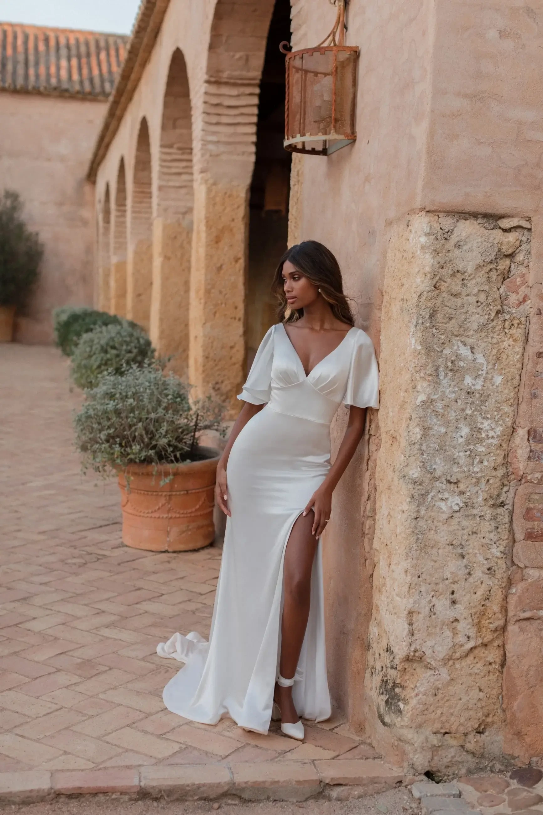 Seasonal Dress Guide: Fabrics That Shine in Winter vs. Summer Weddings Image